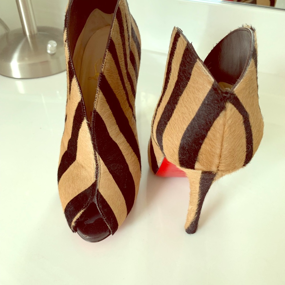 Louboutin tiger print booties. Size 39.5